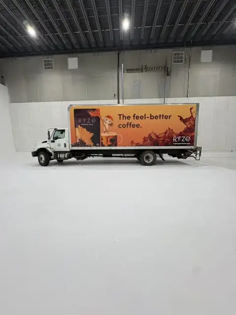 Box truck wrap for RYZE: full box wrap with photo-real product art, driver side. Installed by Sheridan Print in the Chicago area.