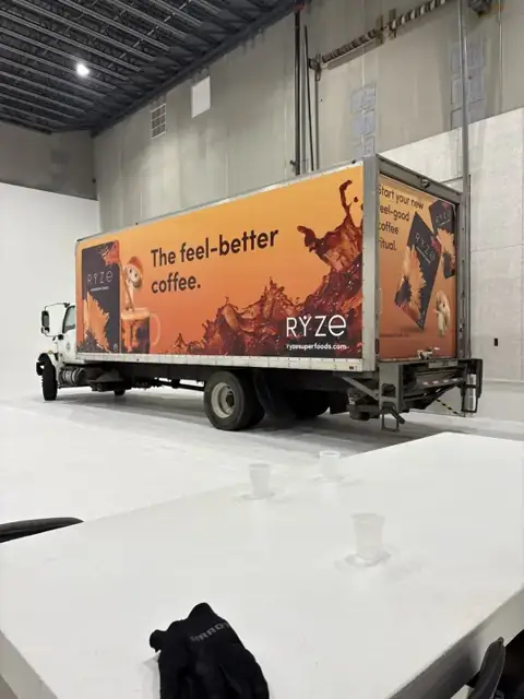 Box truck wrap for RYZE: same ryze truck from the front corner. Installed by Sheridan Print in the Chicago area.