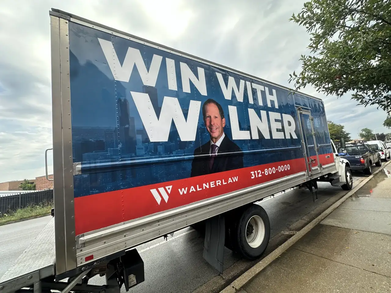 Box truck wrap for Walner Law: high-contrast billboard wrap for a law firm. Installed by Sheridan Print in the Chicago area.