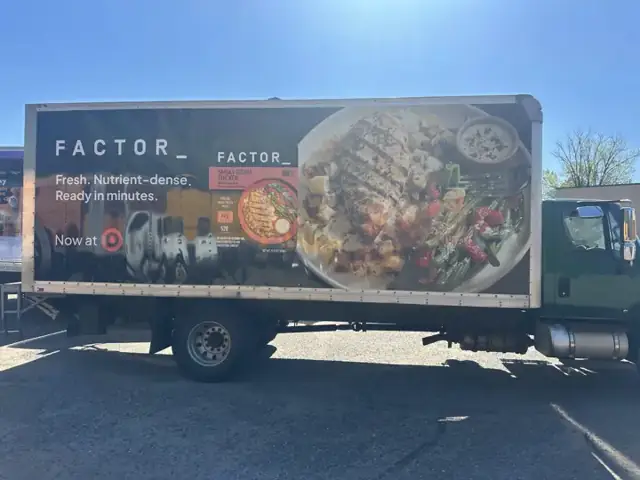 Box truck wrap for Factor: food photography across a 20-plus-foot box. Installed by Sheridan Print in the Chicago area.