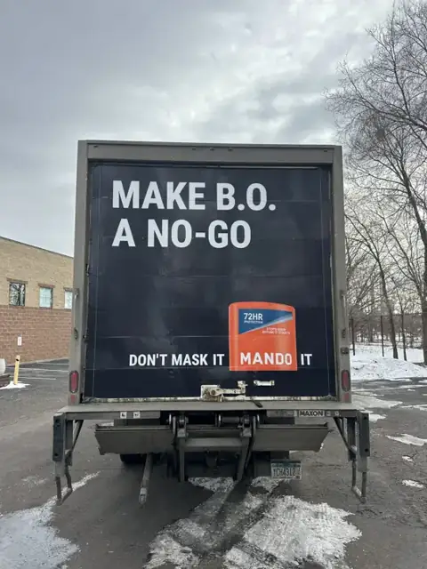 Box truck wrap for Mando: rear-door message panel. Installed by Sheridan Print in the Chicago area.