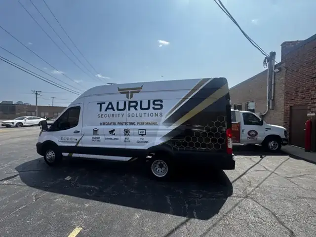 Van wrap for Taurus Security: partial van wrap for a security company. Installed by Sheridan Print in the Chicago area.