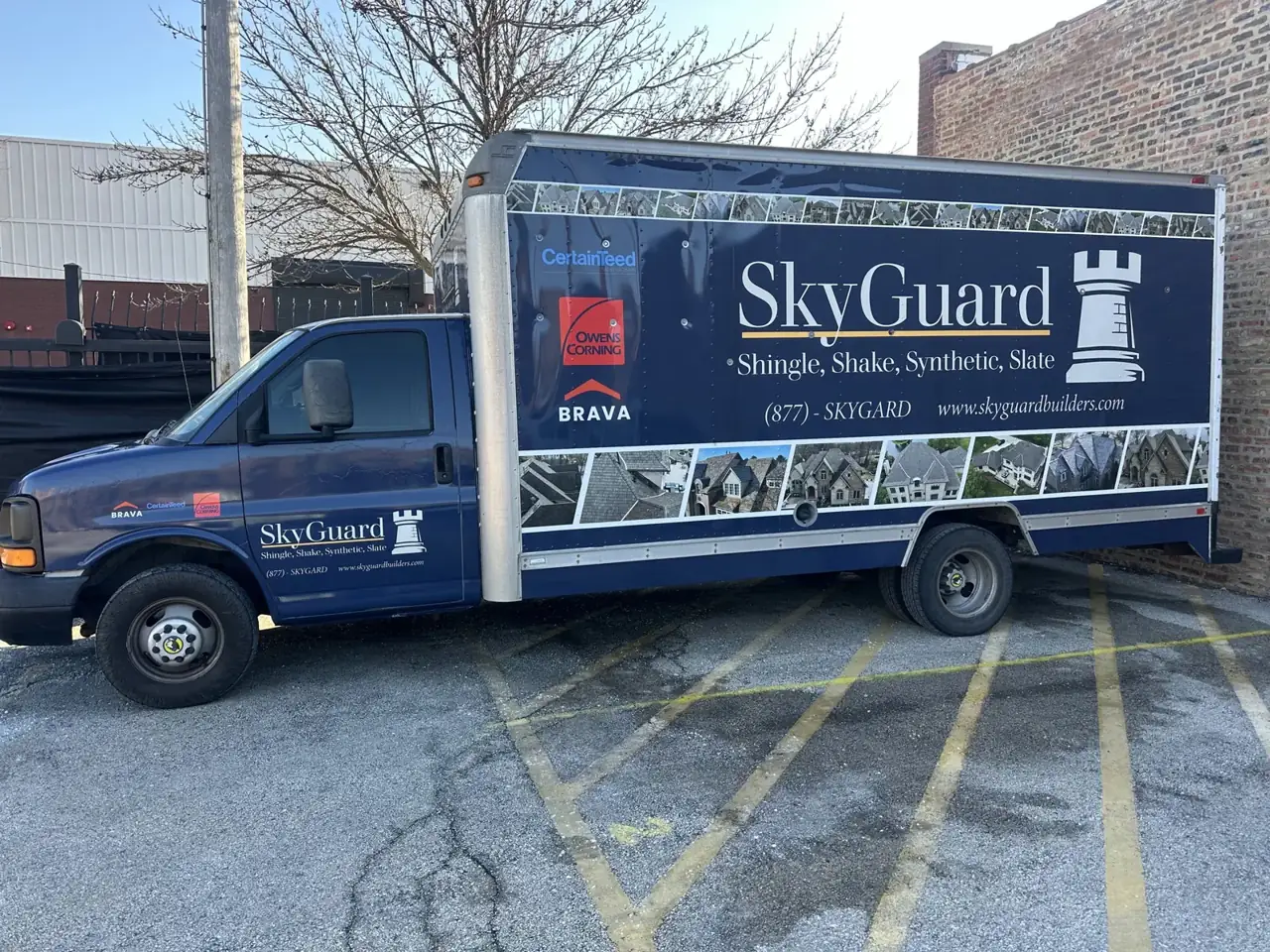 Box truck wrap for SkyGuard Roofing: box truck wrap for a roofing contractor. Installed by Sheridan Print in the Chicago area.