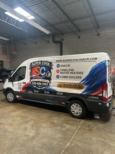 Van wrap for Super Cool HVAC: hvac van wrap with service list and phone. Installed by Sheridan Print in the Chicago area.