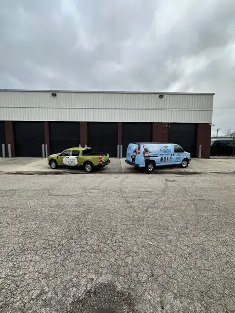 Car wraps for Clean Slate by Cara: two-vehicle branded set, overhead view. Installed by Sheridan Print in the Chicago area.