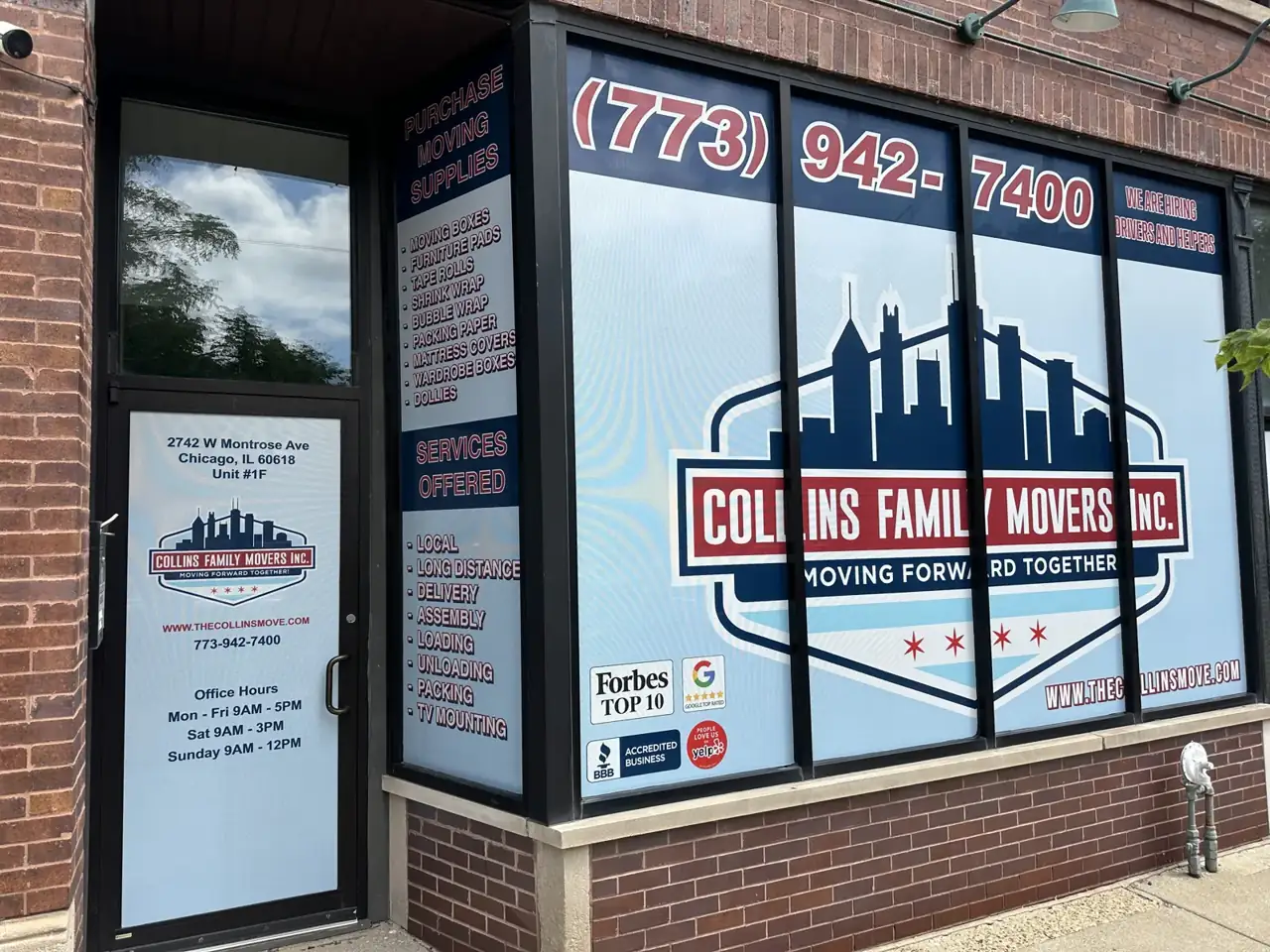 Window graphics for Collins Family Movers: storefront windows with phone, services, hours, and logo. Installed by Sheridan Print in the Chicago area.